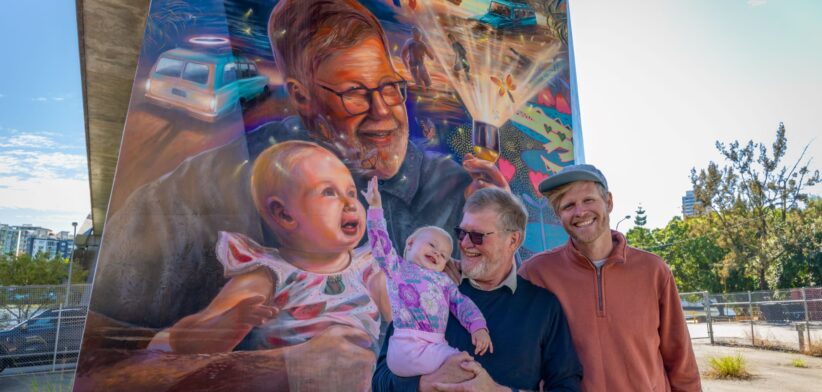 Sunshine Coast artist Joel Fergie with his father and daughter. | Newsreel