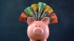 Piggy bank with Australian dollars. | Newsreel