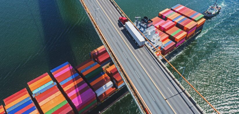 Cargo ship and truck. \ Newsreel