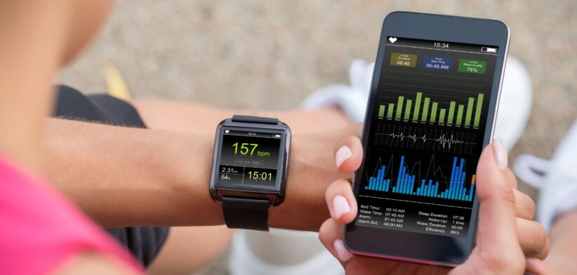 Woman checking data after exercise. | Newsreel