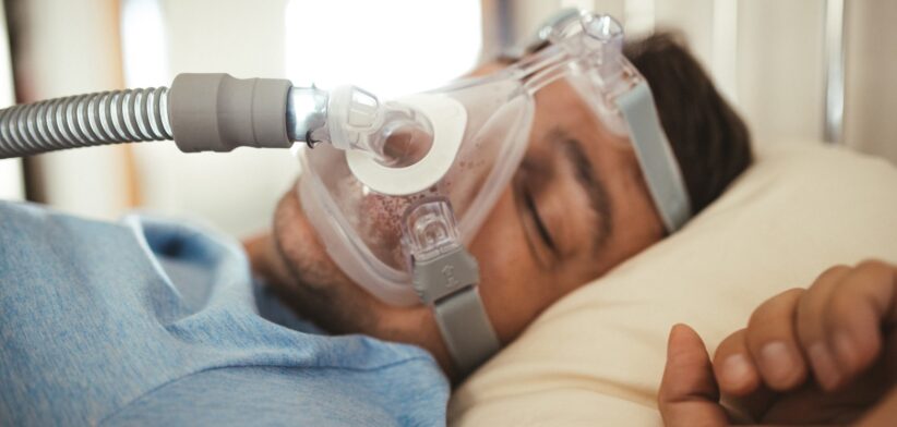 Man on CPAP machine.