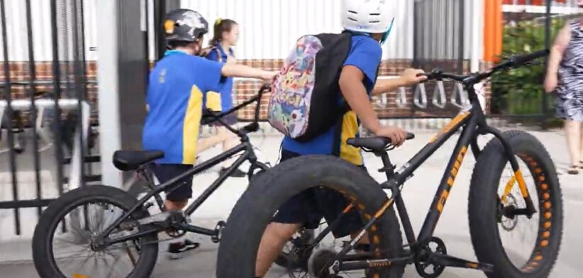 Children cycling to school. | Newsreel