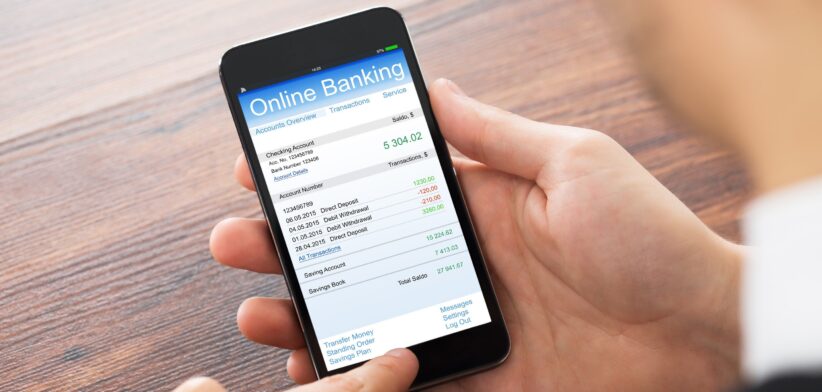 Person banking on phone.
