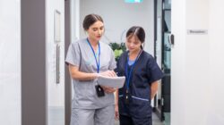 Student nurse with supervisor. | Newsreel