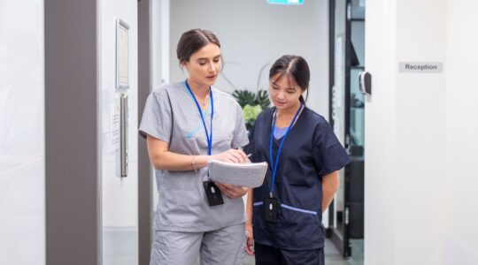 Student nurse with supervisor. | Newsreel
