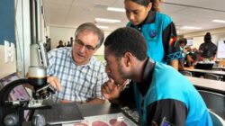 QIMR researcher with students in Far North Queensland
