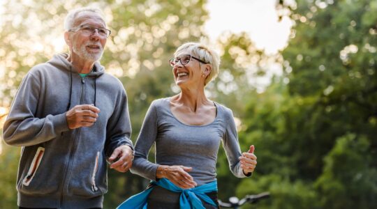 Elderly couple jogging. | Newsreel
