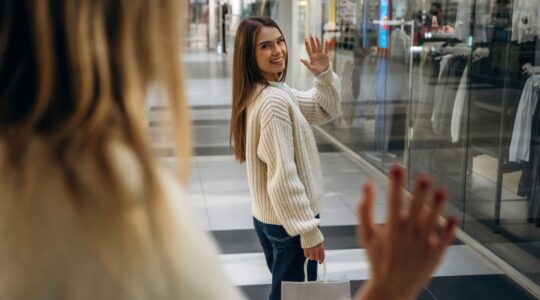 Shopper waving goodbye.