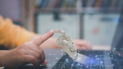 Robot and human fingers touching. | Newsreel