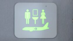 Aircraft toilet sign. | Newsreel