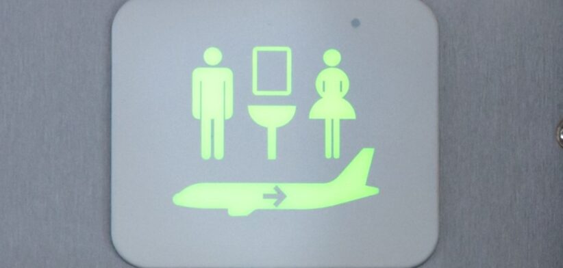 Aircraft toilet sign. | Newsreel