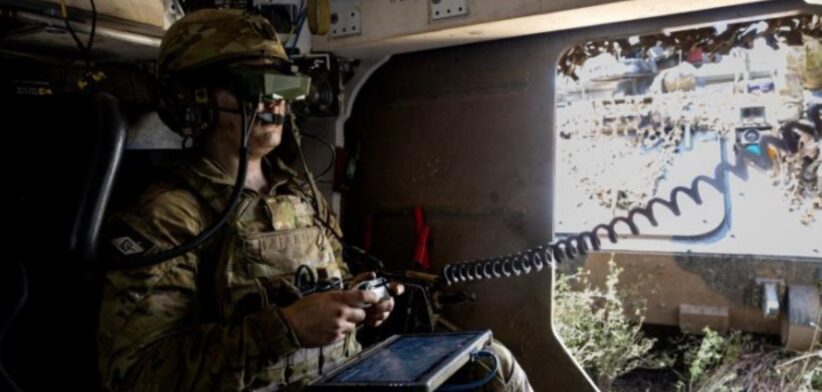 Private Eid Muhammad, from the 1st Armoured Regiment, controls the M134D minigun remote weapon station attached to a Modular Robotic Vehicle during Exercise Talisman Sabre.