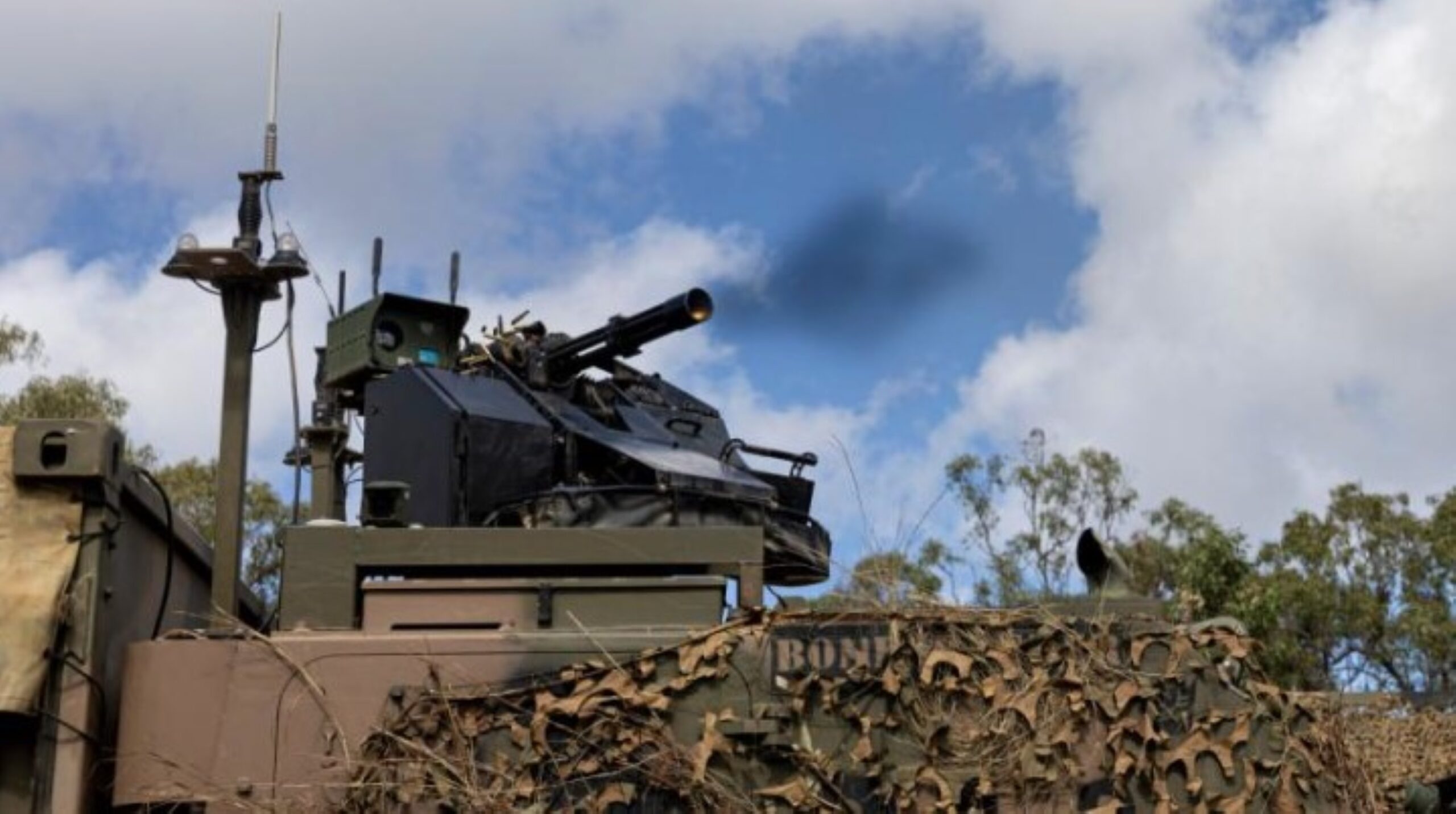 The M134D minigun remote weapon station attached to a Modular Robotic Vehicle. | Newsreel