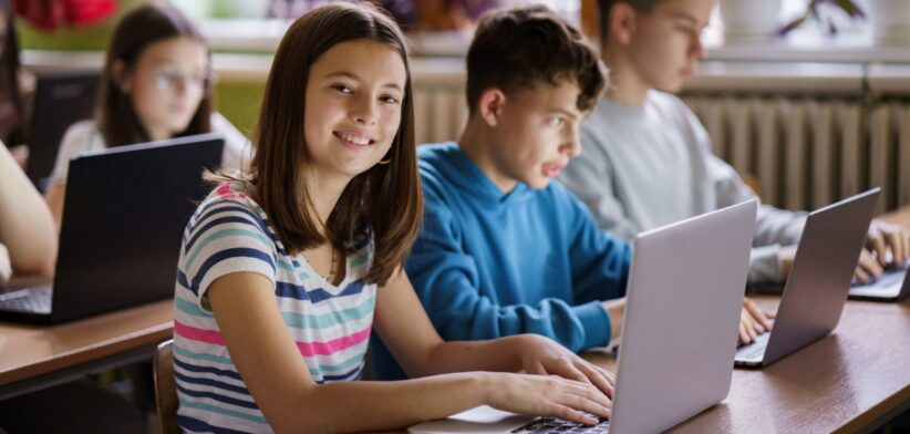 Happy student in classroom. | Newsreel