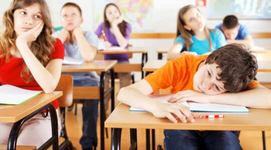 Bored and hot students in classroom. | Newsreel