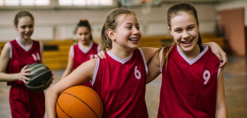 Young girls playing basketball. | Newsreel