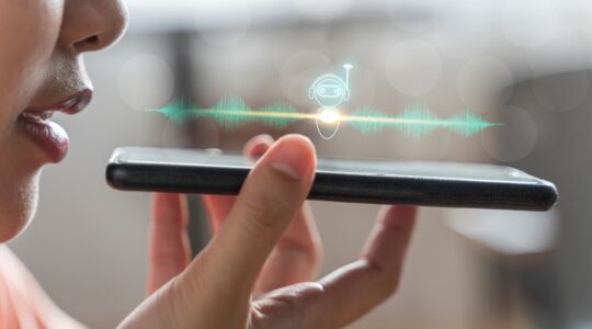 Person talking into phone. | Newsreel