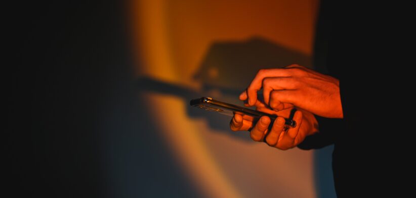 Person on phone. | Newsreel