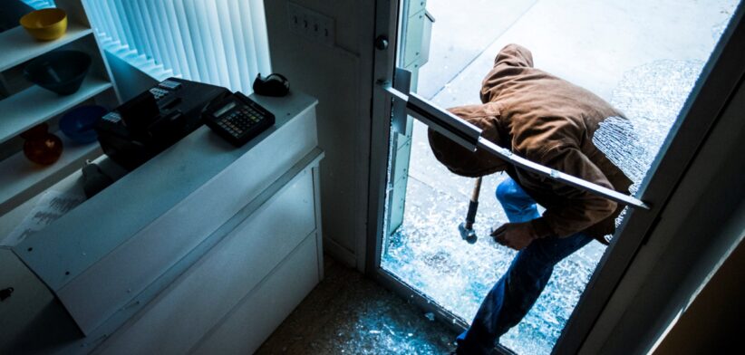 Person breaking into store. | Newsreel