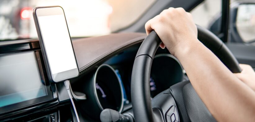 Phone in car. | Newsreel