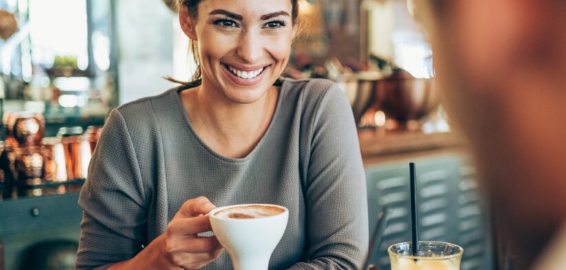 Woman drinking coffee. | Newsreel