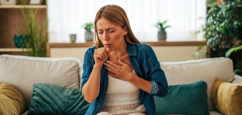 Woman coughing. | Newseel