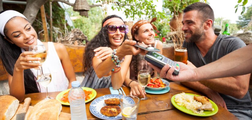 Friends at a restaurant. | Newsreel