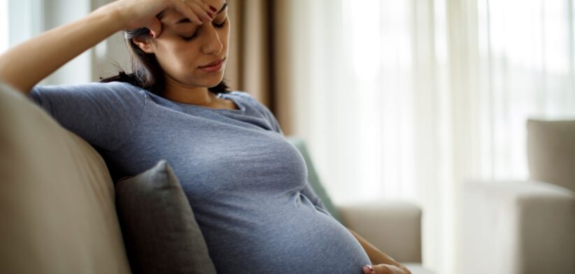 Pregnant woman with headache.