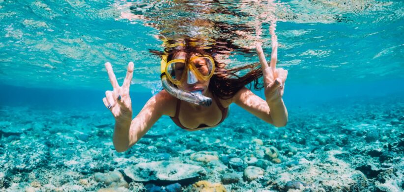 Woman snorkelling in Australia. | Newsreel