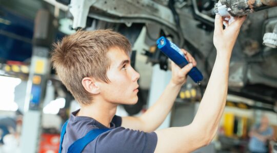 Apprentice mechanic. | Newsreel