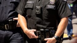 US Police officer with body camera. | Newsreel