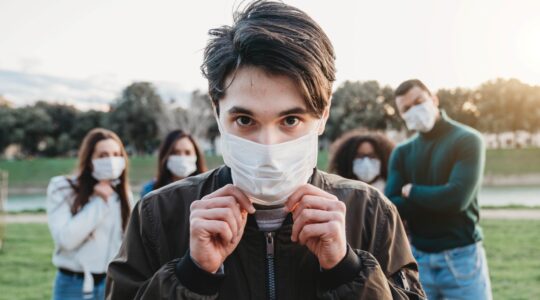 Man wearing mask. | Newsreel