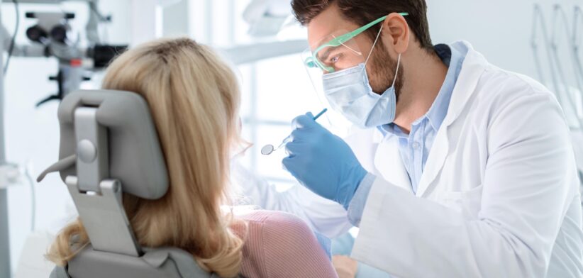 Dentist and patient. | Newsreel