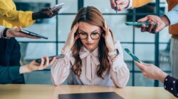 Woman stressed at work. | Newsreel