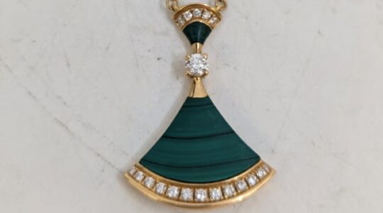 Bvlgari 18K gold diamond necklace. | Newsreel