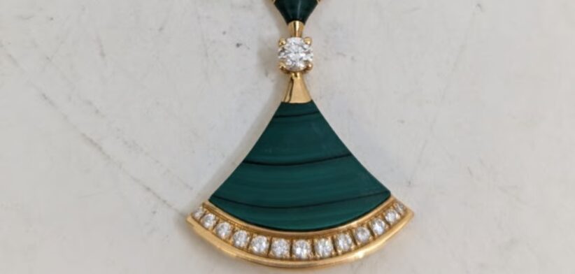 Bvlgari 18K gold diamond necklace. | Newsreel