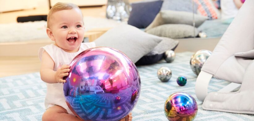 Baby with ball. | Newsreel