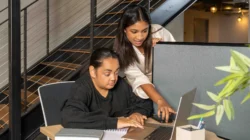 Two woman working. | Newsreel