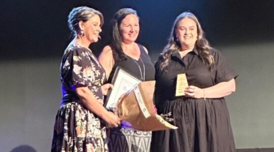 Hayley Jacka and her team accept the ACT Education and Care Award. | Newsreel