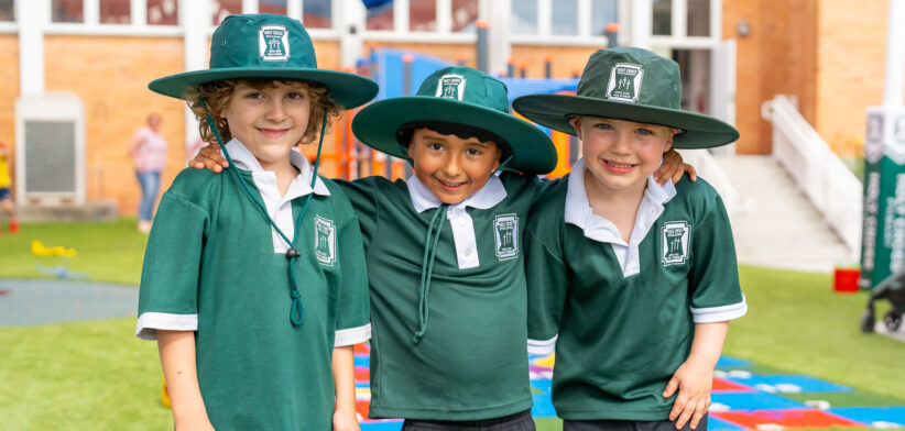 Three students at Holy Cross Primary School, Wooloowin - Newsreel