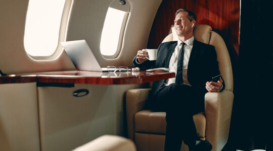 Businessman in private jet