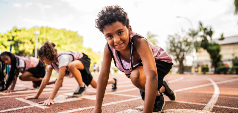 Portrait of a athlete boy on a running track