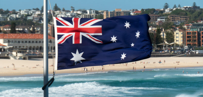 An Australian flag at half mast at Bondi Beach.