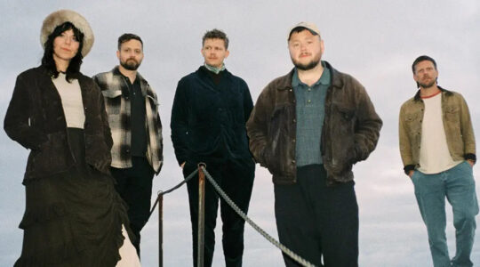 A woman and four men