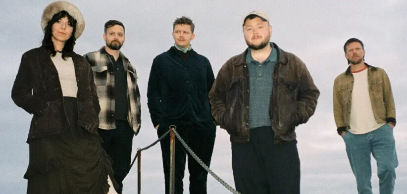 A woman and four men