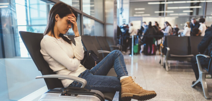 Exhausted passenger at the airport