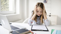 Little Student Girl Studying At School