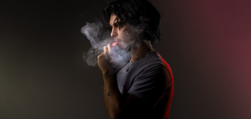 Young Adult Using Disposable Vape