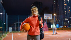 Basketball player walking with ball in hand