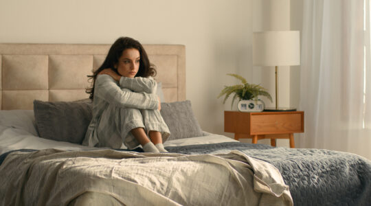 Woman hugging herself bed bedroom girl female hotel looking window rest relax calmness tranquility accommodation insurance wake up weekend cozy morning wellbeing daydream peaceful apartment domestic